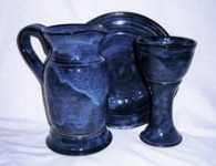 photo of Congregational Size Communion Set by Debra Ocepek of Ocepek Pottery, in Neuhaus Pattern