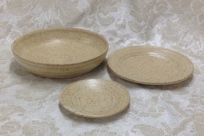photo of 3 patens in cream glaze by Ocepek Pottery