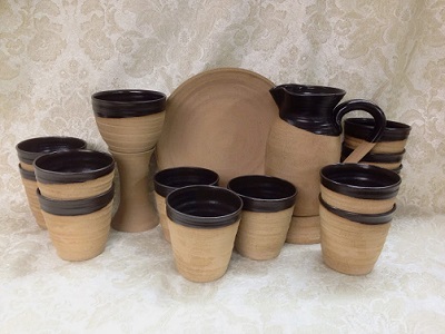 photo of plain rustic lord's supper chalice, paten, flagon, cups made by Debra Ocepek of Ocepek Pottery