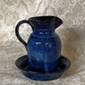 photo of stoneware communion cruet pitcher and bowl in Neuhaus glaze made by Debra Ocepek of Ocepek Pottery